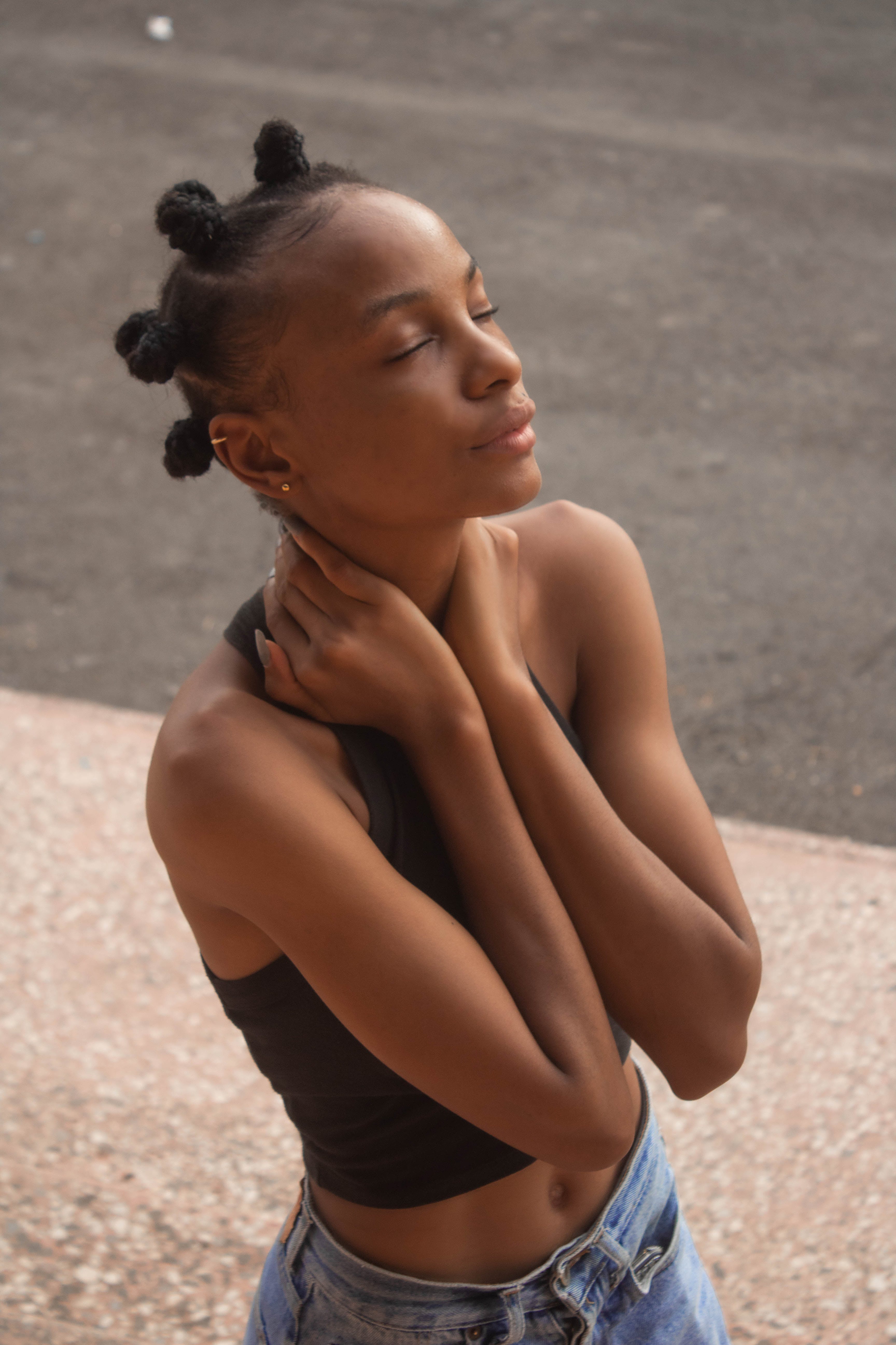 woman rocking a bantu knot hairstyle