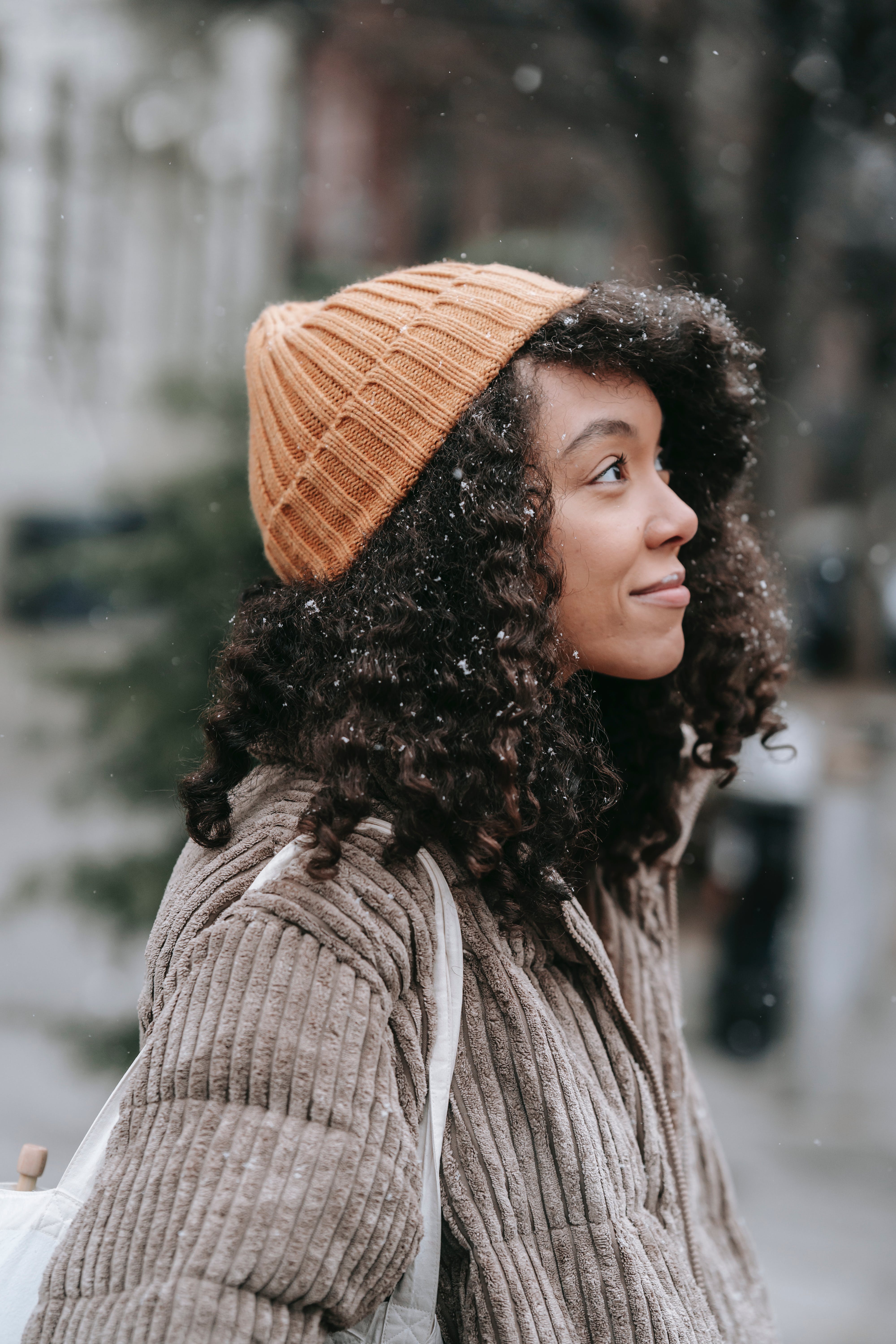 woman rocking a twist out hairstyle